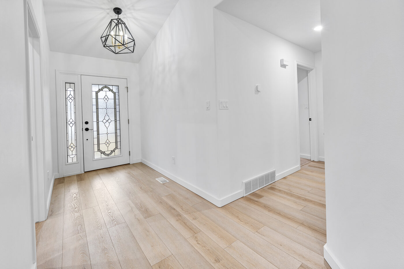 Wide angle of open concept main level at 625 Vale Lane Rexburg Idaho